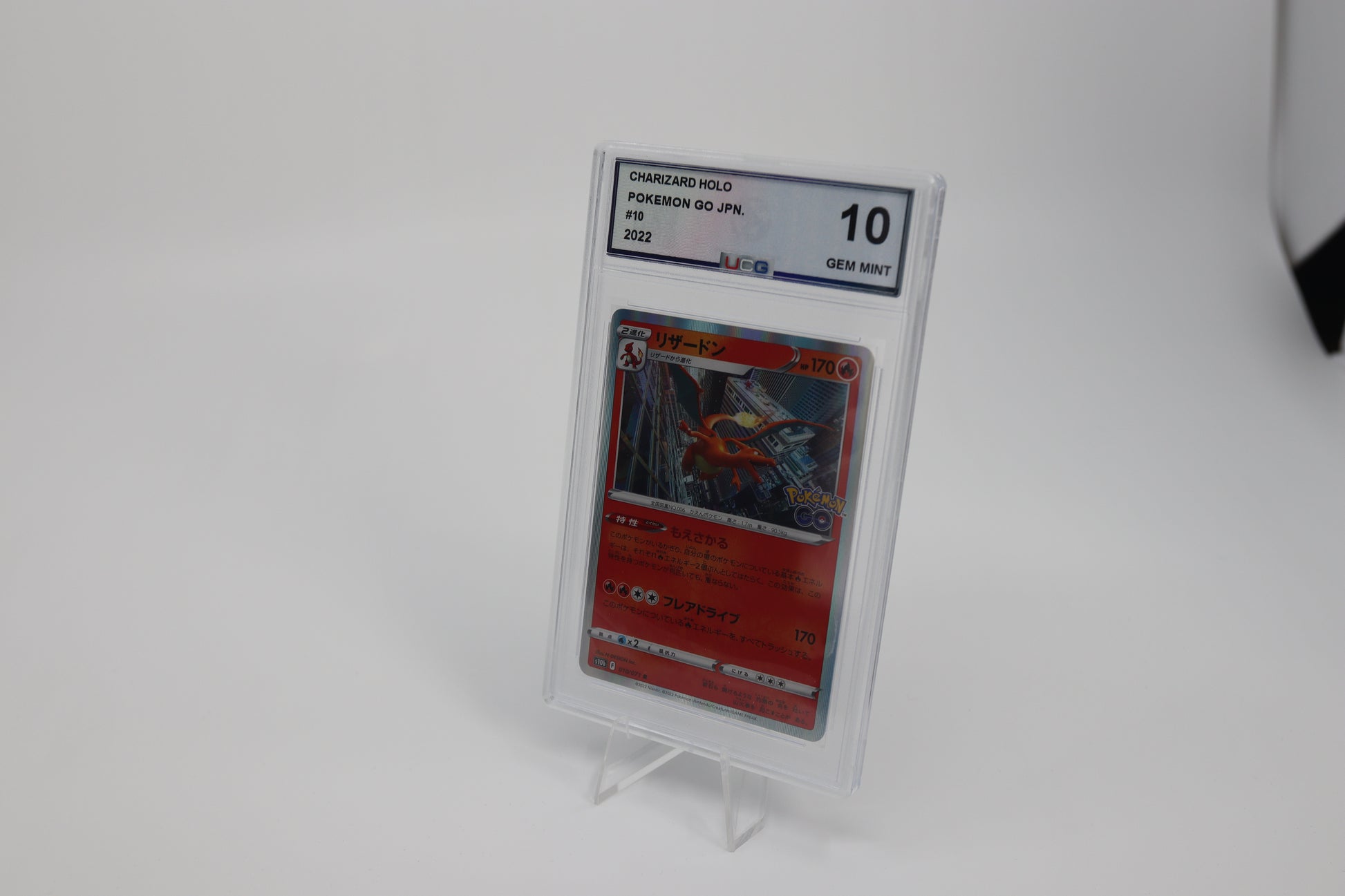 Graded UCG Charizard Go Holo 2022 010/071 JP - Lootaku